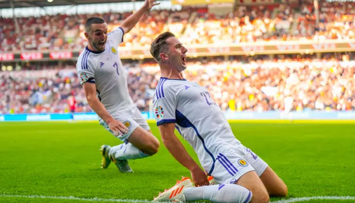 Kenny McLean celebrates after his 89th-minute goal gives Scotland the lead against Norway. —EPA