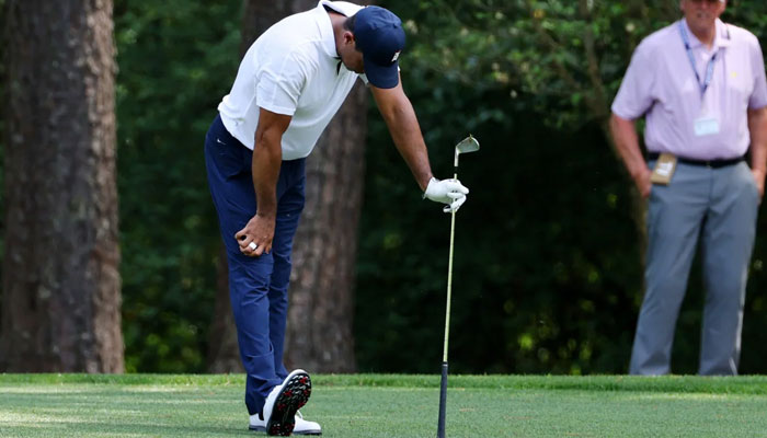 Woods could be seen visibly struggling with movement at The Masters.—Reuters