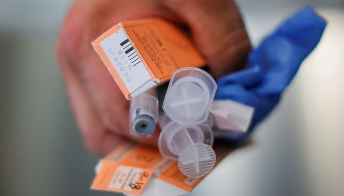 A Cataldo Ambulance medic holds used doses of naloxone in the Boston suburb of Salem, Massachusetts, US. — Reuters/File