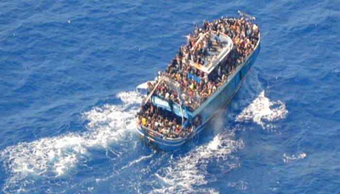 A undated handout photo provided by the Hellenic Coast Guard shows migrants onboard a boat during a rescue operation, before their boat capsized on the open sea, off Greece, June 14, 2023. — Reuters