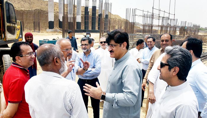 Sindh Chief Minister Syed Murad Ali Shah inspects an under-construction flyover of the Malir Expressway in the Korangi area on June 18, 2023. — INP