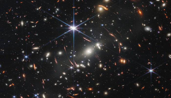 The image shows galaxy cluster SMACS 0723. Some of the galaxies appear smeared or stretched due to a phenomenon called gravitational lensing. This effect can help scientists map the presence of dark matter in the universe. — Nasa/File