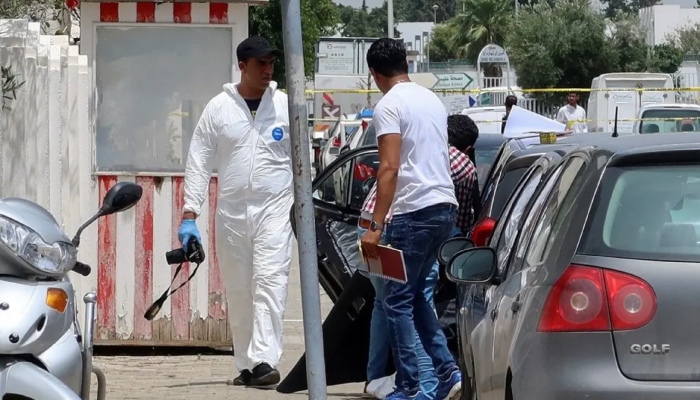 A forensic expert walks near the Brazilian embassy in Tunis, after a man stabbed a policeman near the embassy, local media reported, Tunisia June 19, 2023. (Reuters)