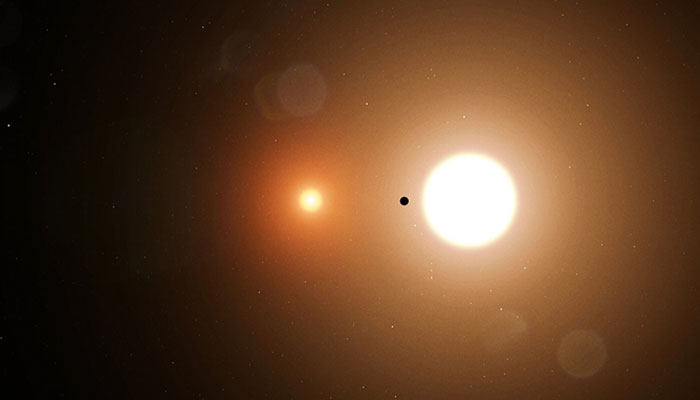 A representational image of a planet orbiting two suns. — Nasa/File