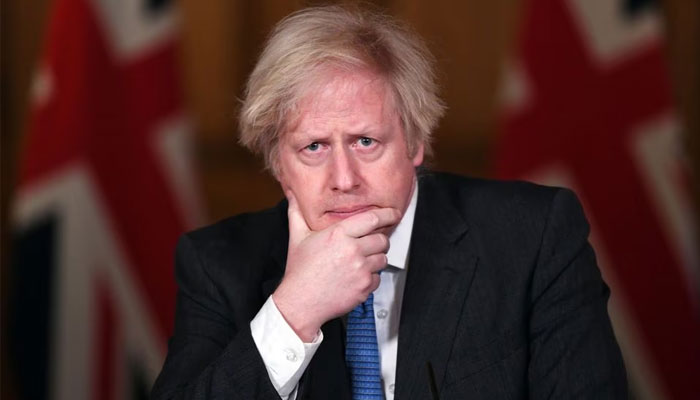 Former British prime minister Boris Johnson attends a coronavirus pandemic media briefing at Downing Street, London, February 15, 2021. — Reuters