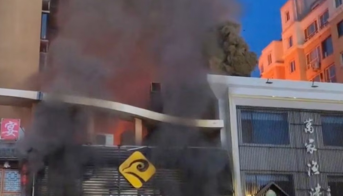 Smoke rises from a building following a gas explosion at a barbecue restaurant in Yinchuan city, Ningxia, China, June 21, 2023, in this screenshot obtained from a handout video — REUTERS