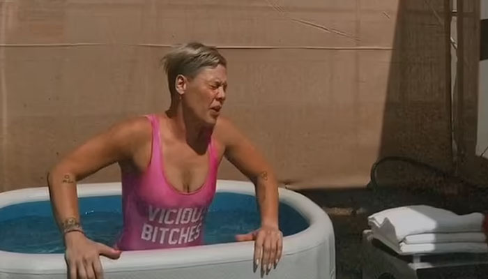 Pink stuns in swimsuit as she takes ice bath backstage