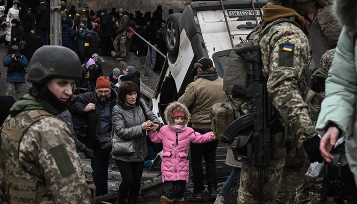 Civilians attempt to evacuate from the Kyiv suburb of Irpin. — AFP/File