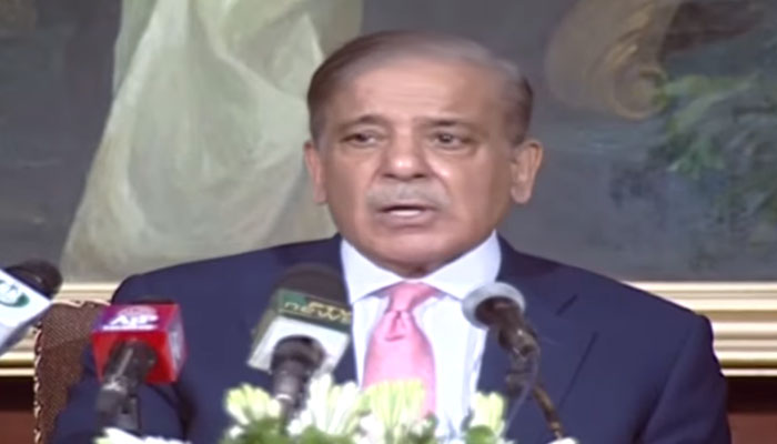 Prime Minister Shehbaz Sharif addressing the media after overseeing the signing of the SLA with IMF. — Screengrab/PTV/YouTube