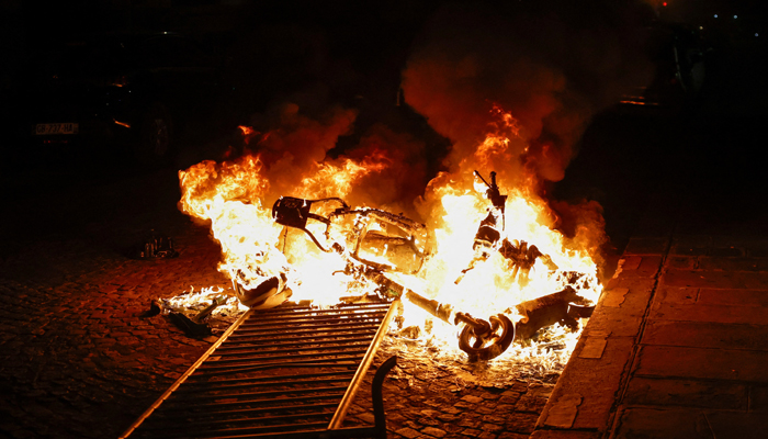 A burning motorbike seen during the fifth day of protests following the death a 17-year-old teenager killed by a French police officer in Nanterre during a traffic stop, in Paris, France, July 2, 2023. — Reuters