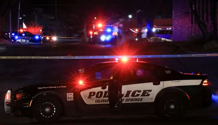 A police officer sits in their vehicle while responding to a mass shooting at a nightclub in Colorado Springs, Colorado, US. — Reuters/File