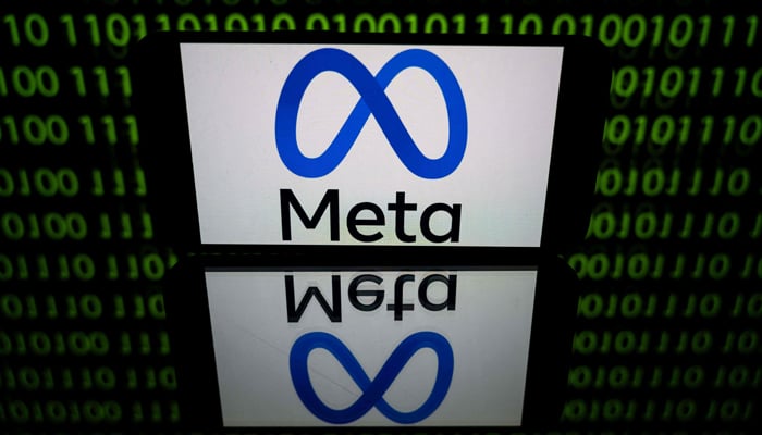 This photo shows a tablet displaying the logo of the company Meta. — AFP/File