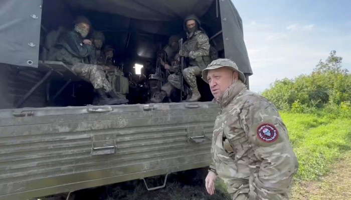 Founder of Wagner private mercenary group Yevgeny Prigozhin speaks with servicemen during the withdrawal of his forces from Bakhmut in this still image taken from video released June 1, 2023. — Reuters