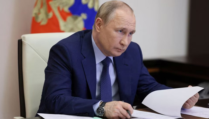 Russian President Vladimir Putin attends a meeting on road construction development via video link at the Novo-Ogaryovo state residence outside Moscow, Russia June 2, 2022. — Reuters