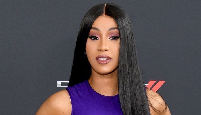 Cardi Bs humorous exit with her security guard after Paris Fashion Week