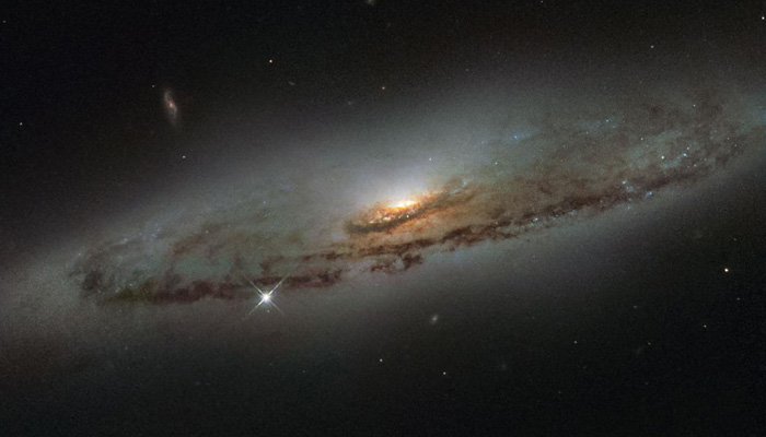 This spiral galaxy hosts a supermassive black hole thats also super-hungry. — Twitter/Nasa