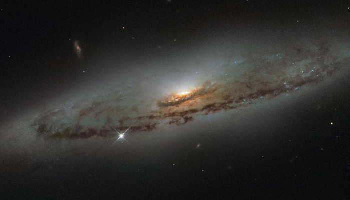 This spiral galaxy hosts a supermassive black hole thats also super-hungry. — Twitter/@Nasa