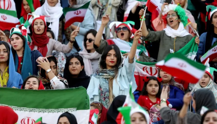 Iranian women attend Irans World Cup Asian qualifier against Cambodia at the Azadi stadium in Tehran, Iran October 10, 2019. — Reuters