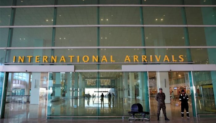 Airport Security Force (ASF) personnel stand guard at the International arrivals area during a media tour of the newly built Islamabad International Airport, ahead of its official opening, Pakistan April 18, 2018. — Reuters