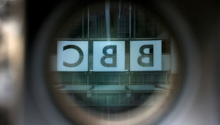 A BBC logo is reflected in the viewfinder of a television camera outside the British Broadcasting Corporation (BBC) headquarters in London, Britain, March 13, 2023. —Reuters