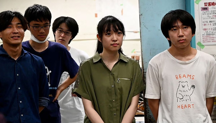 Yuna Kato works with male students at her college club to produce a light human-powered aircraft at the school, at Tokyo University in Tokyo, Japan June 30, 2023, in this screen grab from video. — Reuters