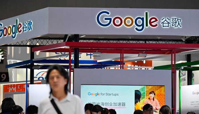 People visit the booth of Google during the World Artificial Intelligence Conference (WAIC) in Shanghai on July 6, 2023. — AFP