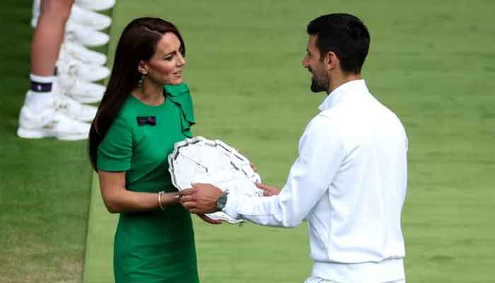 Kate Middleton turns heads as she hands Wimbledons champion Carlos Alcaraz trophy