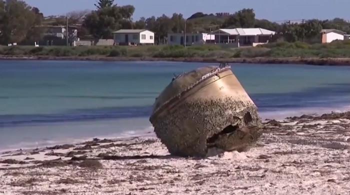 WATCH: Is this object on Australia beach part of missing MH370 flight ...