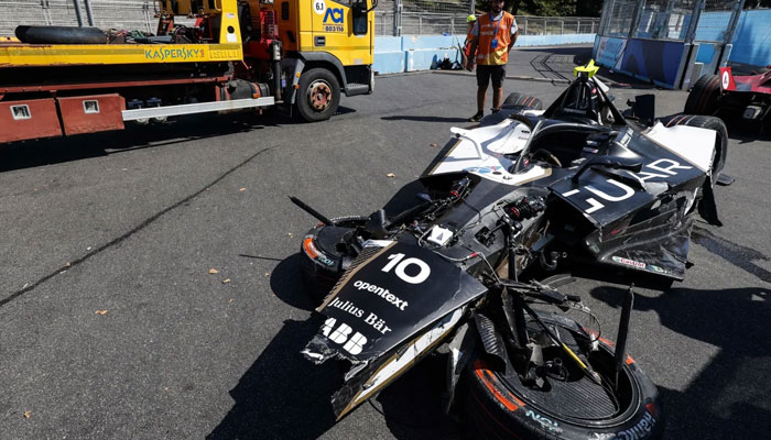 Birds car after the high-speed crash.—EPA