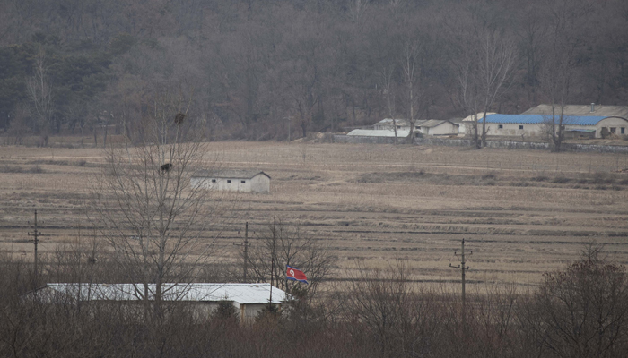 The North Korean village Gijungdong is seen from a South Korean observation post inside the Joint Security Area (JSA) during a media tour at the Demilitarised Zone (DMZ) in the border village of Panmunjom in Paju on 03 March 2023. — AFP