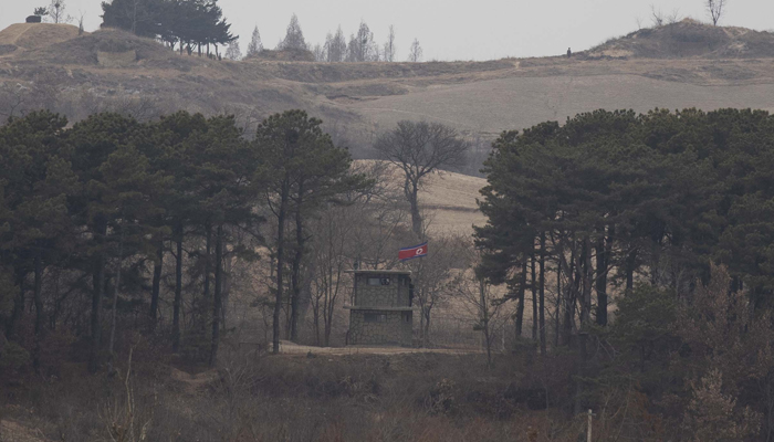 A North Korean guard post is seen from a South Korean observation post inside the Joint Security Area (JSA) during a media tour at the Demilitarised Zone (DMZ) in the border village of Panmunjom in Paju on 03 March 2023. — AFP