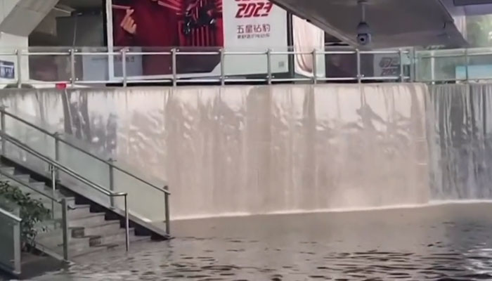 Screengrab of a YouTube video of a flooded railway station in China.