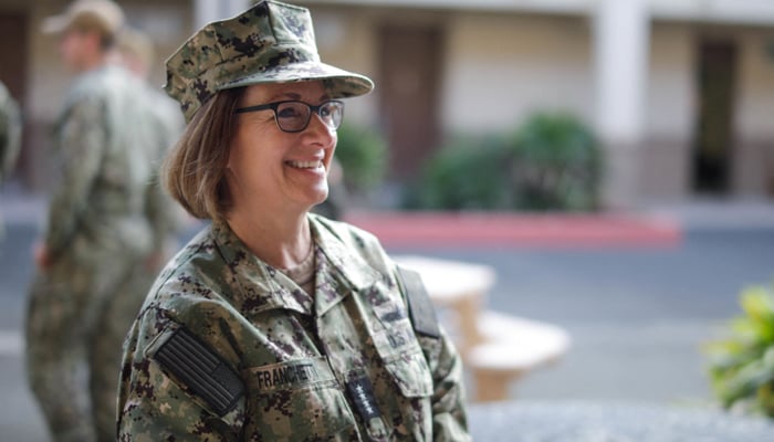 In this image, US Navy Admiral Lisa Franchetti, vice chief of Naval Operations, speaks with Naval Supply Detachment staff during a tour of Marine Corps Base Hawaii in Oahu on December 13, 2022. — AFP