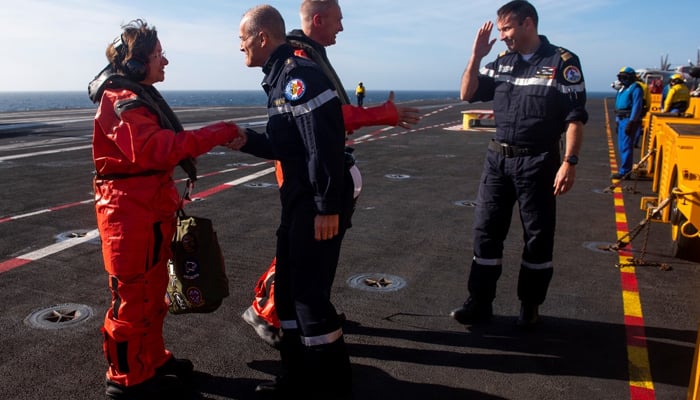The then US 6th Fleet commander, Admiral Lisa Franchetti, meeting with the operational commander for the Mediterranean, Vice Admiral Charles-Henri du Ché, on her visit to the French aircraft carrier FS Charles de Gaulle on March 7, 2019. — US Naval Forces Europe and Africa/US Sixth Fleet/French Navy photographer Yoann Letourneau