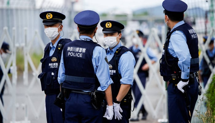 Japanese police while investigating a crime scene in Japan. — Reuters/File