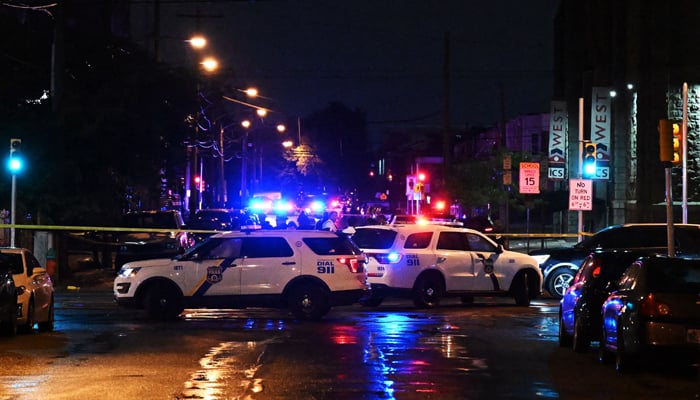 Police work the scene of a shooting on July 3, 2023, in Philadelphia, Pennsylvania. — AFP