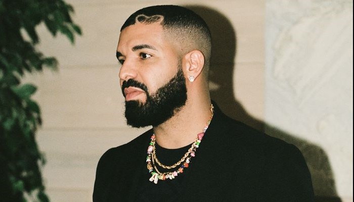 Drakes double dog mask appearances fuel album promotion