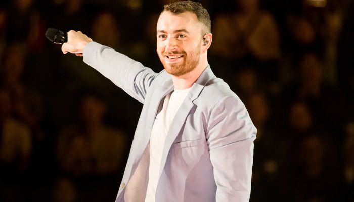 Sam Smith debuts their moustache while on a trip in Georgia