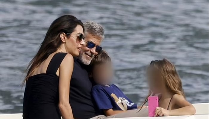 George Clooney pictured with his entire family during outing in Lake Como