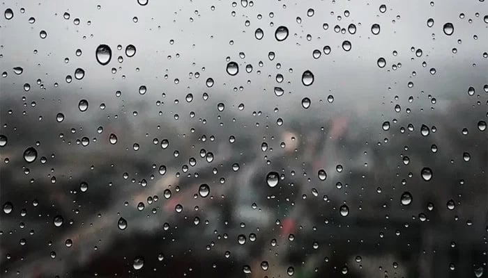 Raindrops on a glass window seen in this representational image. — Unsplash