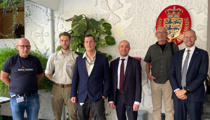 Kjeldsen (right) poses with Ambassador HE Jakob Linulf and an advance team from Danish Emergency Management Agency that was deployed for the floods in Pakistan last Summer. — Danish embassy