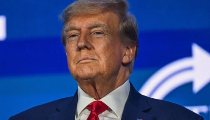 Former President Donald Trump speaking at the Turning Point Action USA conference in West Palm Beach, Florida — AFP/File