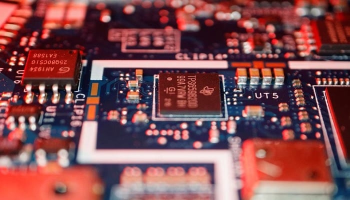 Semiconductor chips are seen on a circuit board of a computer in this illustration picture taken February 25, 2022. — Reuters