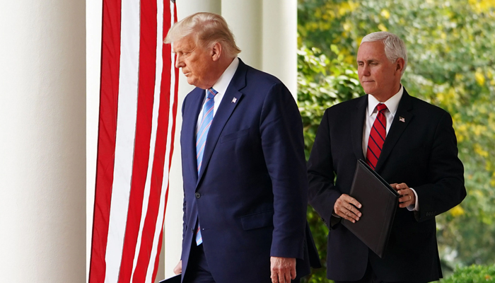 Former US president Donald Trump can be seen with his vice president Mike Pence in this file photo. —USA Today