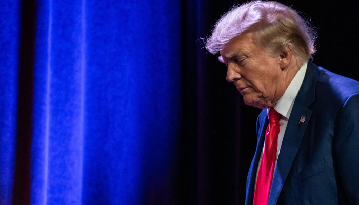 Former US president Donald Trump who was indicted for the third time arrives at Lincoln Dinner at the Iowa Events Center in Des Moines, Iowa, on July 28, 2023. — AFP