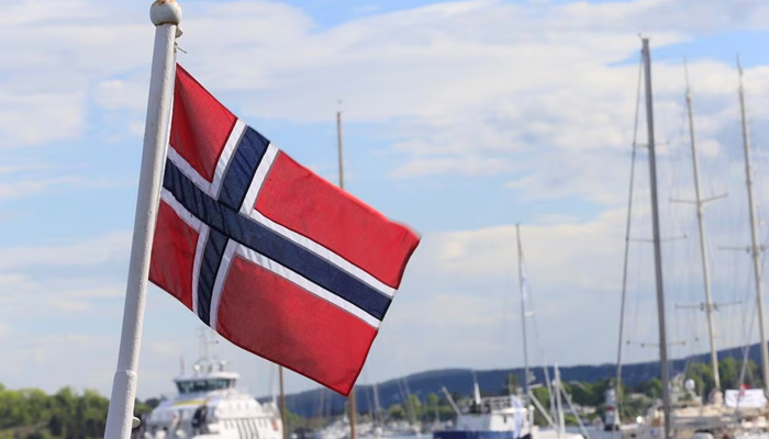 Norwegian flag flutters on the boat at Aker Brygge in Oslo, Norway. — Reuters/File