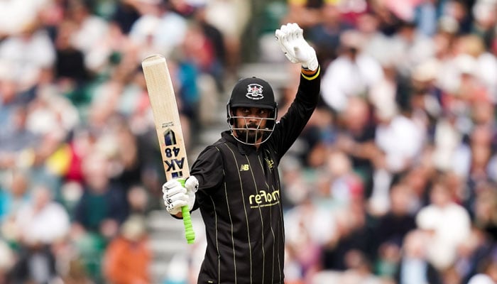 Anwar Ali raises his bat. — Twitter/@Gloscricket