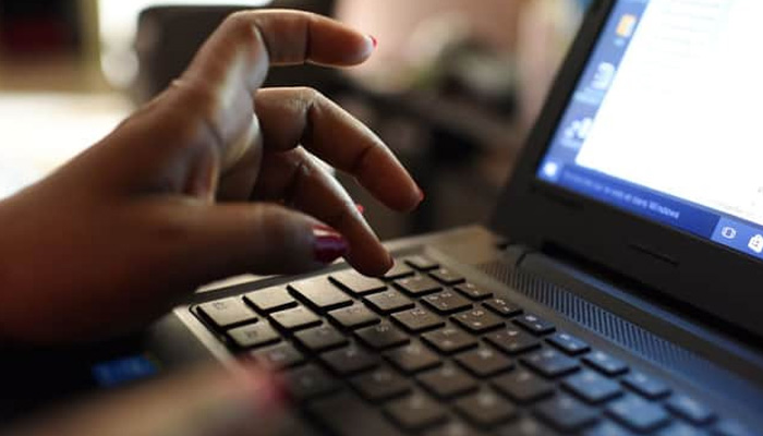 A representational image of a person using a laptop. — AFP/File