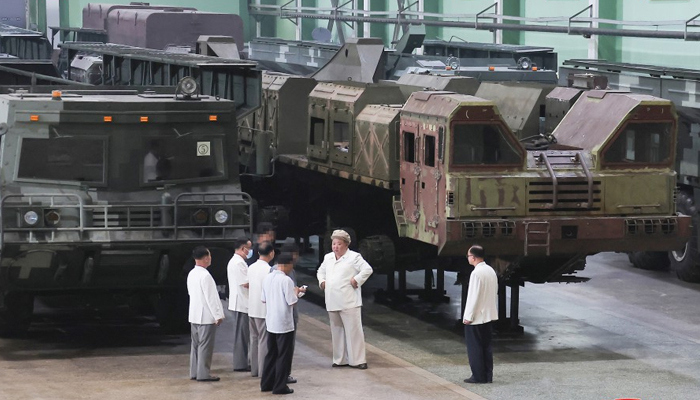 This photo taken on August 6, 2023, shows North Korean leader Kim Jong-un observing a facility of missile carrier vehicles at a factory. — KCNA