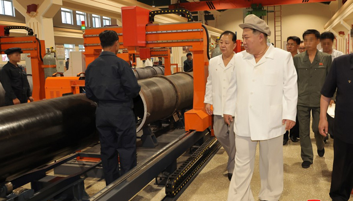 This photo taken on August 6, 2023, shows North Korean leader Kim Jong-un giving field guidance at an arms factory. — KCNA